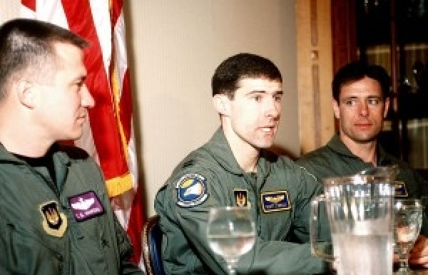 Capt Scott O'Grady in Conference with Buzzard Wingman who Found him.
